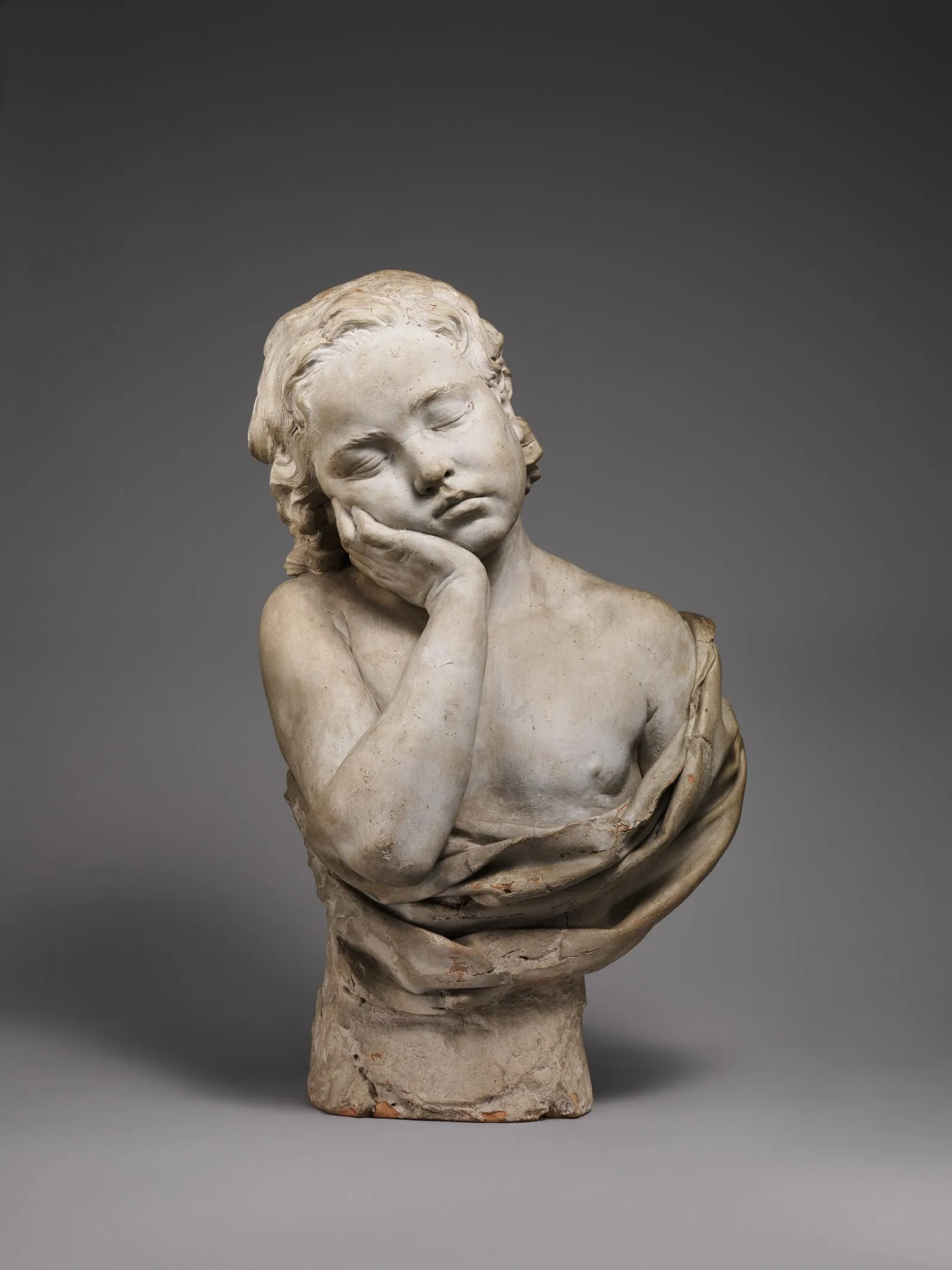 Enfant endormi, buste en terre cuite de Philippe-Laurent Roland, vers 1774